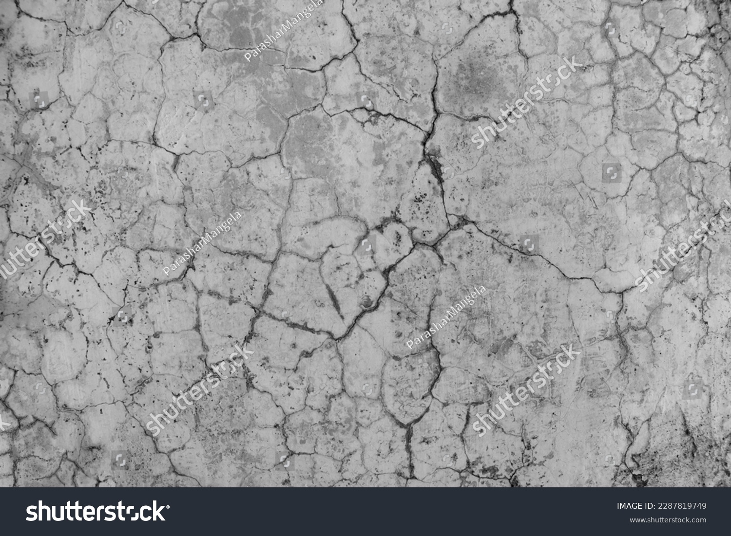 Grey cracked concrete wall texture. Abstract background of crack concrete wall. #2287819749