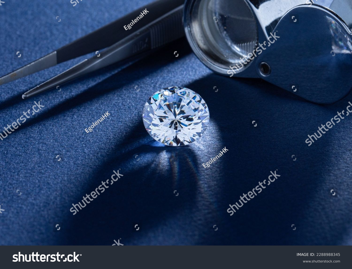Round cut diamond on blue background. #2288988345