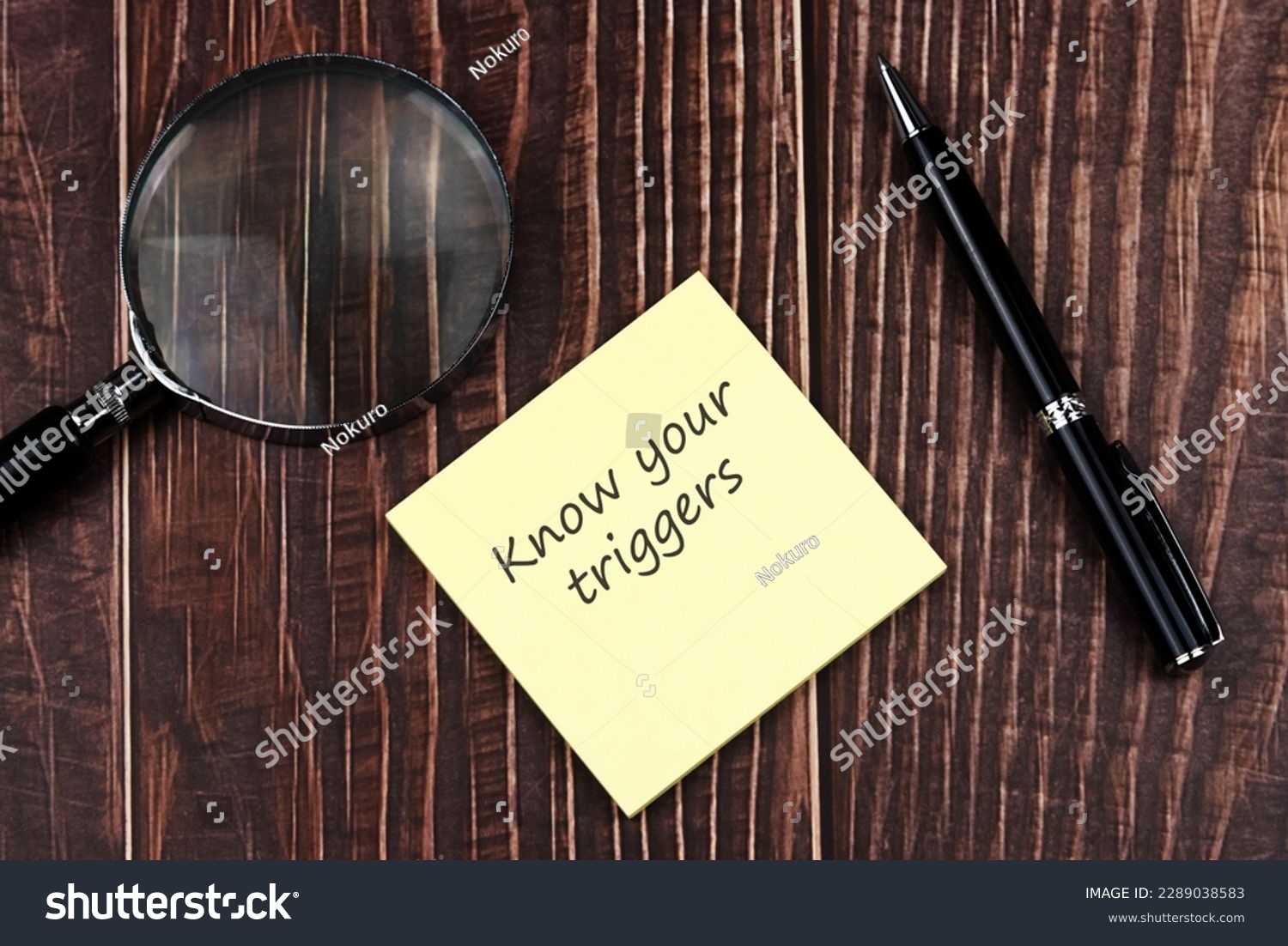 Adhesive note with text know your triggers #2289038583