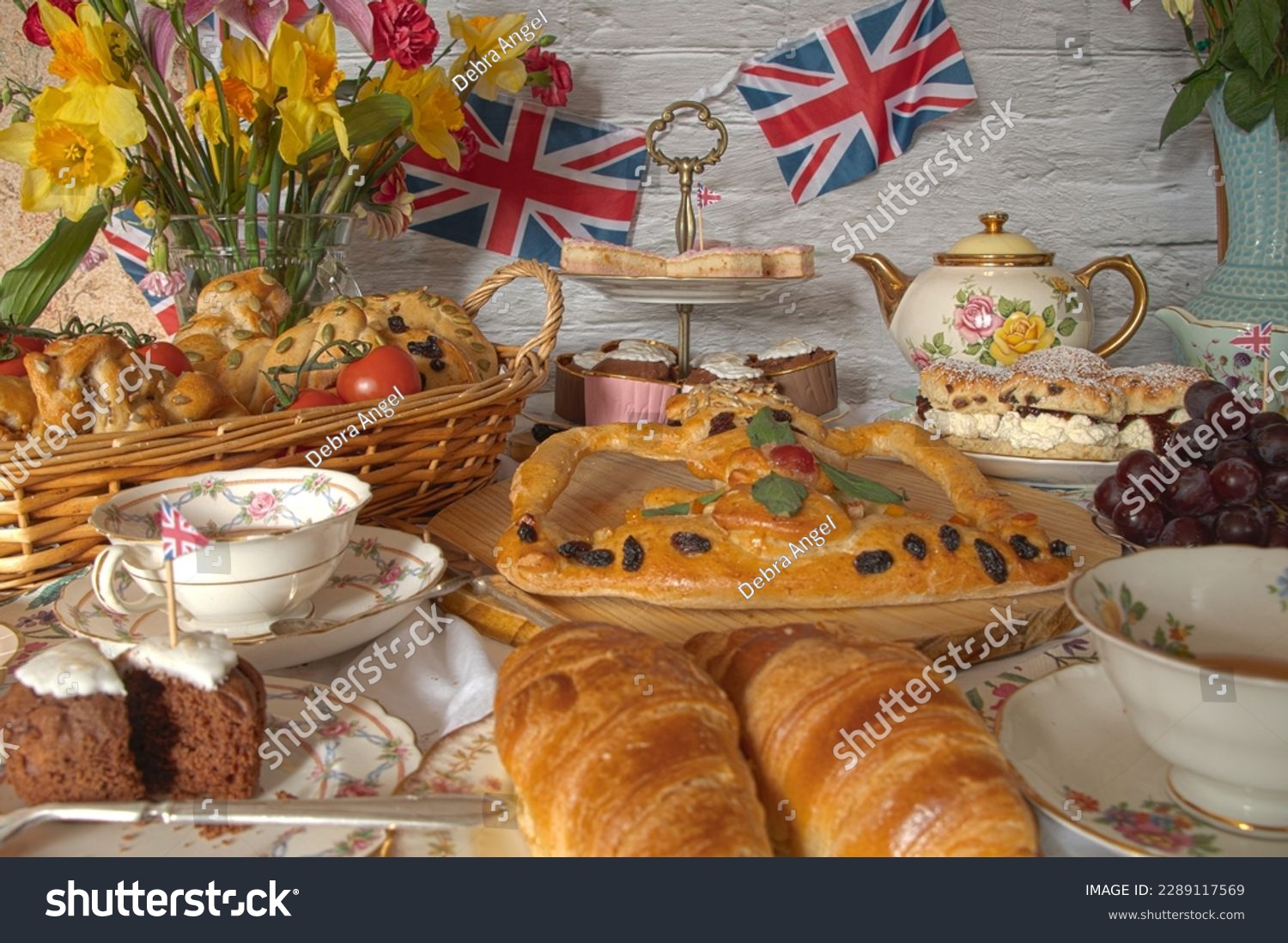 King Charles and Camilla's Coronation Vintage Street Tea Party with royal crown baked  bread  #2289117569