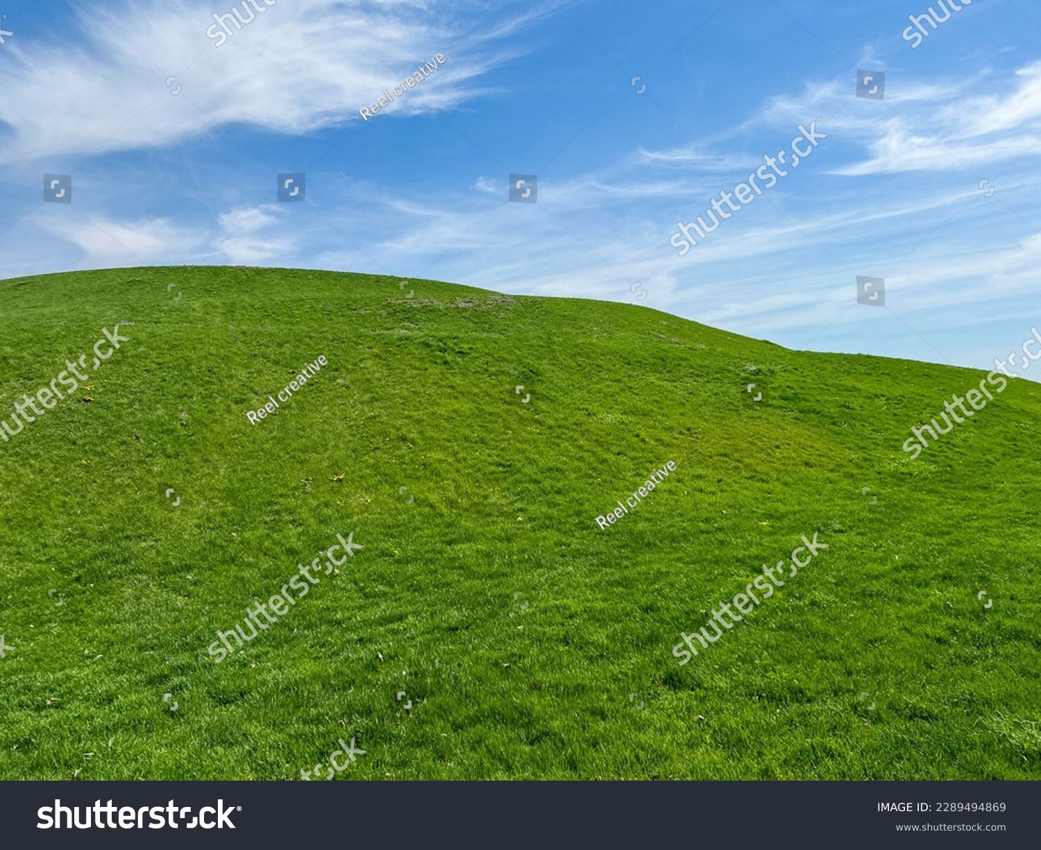 Idyllic Green Hill and Meadow Outdoor Springtime Scene #2289494869