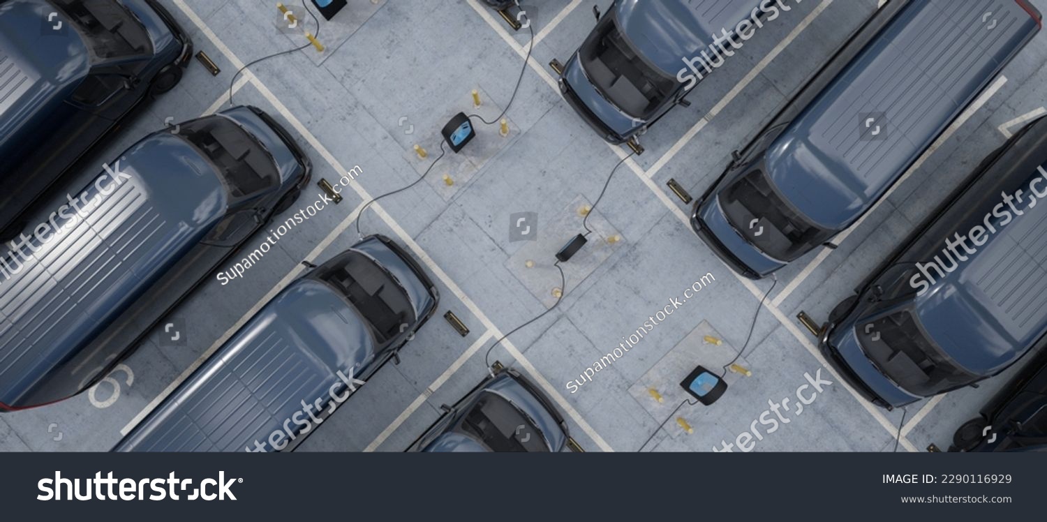 Overhead shot of electric EV delivery vans are being charged in company parking garage #2290116929