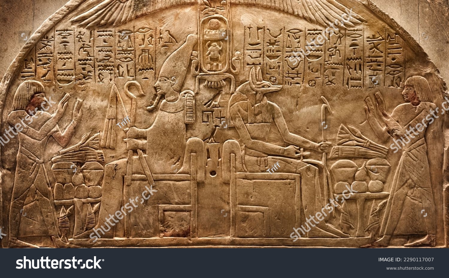Ancient Egyptian deities Osiris and Anubis, Egyptian hieroglyphs.  Historical and culture background. Ancient Egyptian hieroglyphs as a symbol of the history of the Earth.   #2290117007