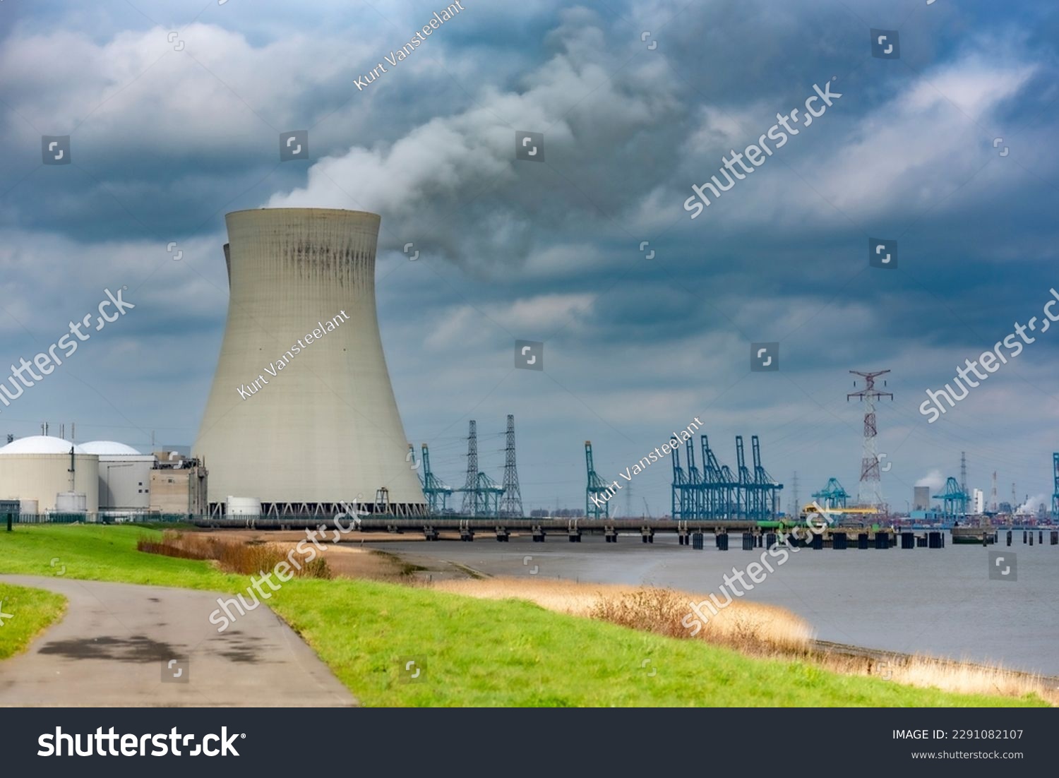 Cooling tower of a nuclear plant near a river #2291082107