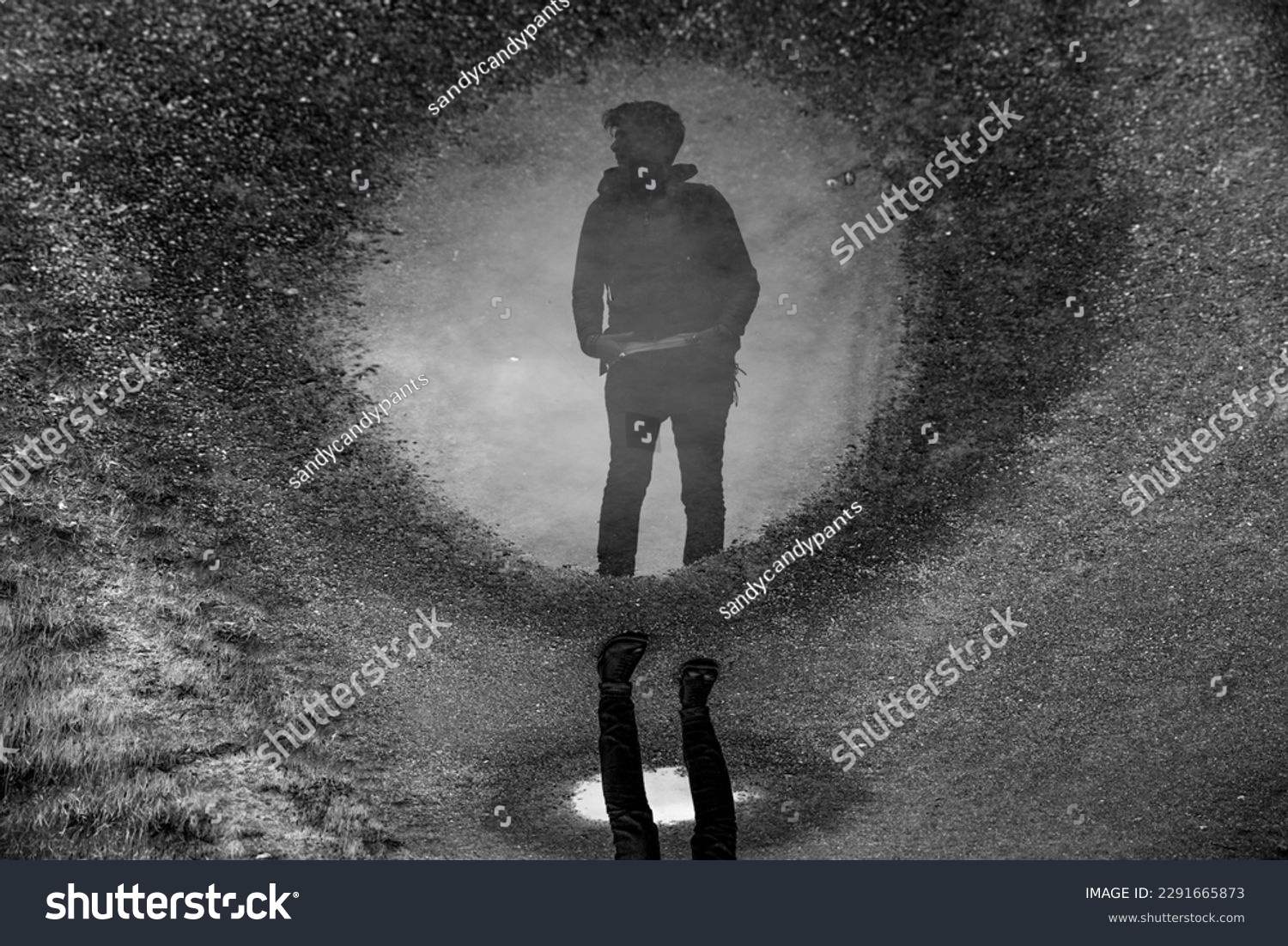 person reflection puddle greyscale dirt road silhouette #2291665873