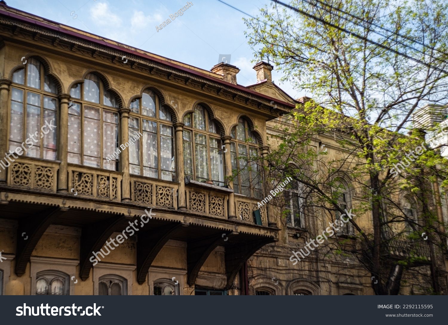 Traditional architecture of Old Tbilisi with carving wooden balconies in spring day #2292115595