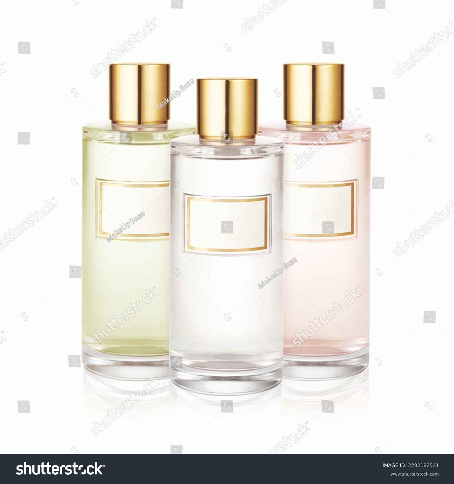 Three Bottle of Perfume Spray. Women's Eau De Parfum in Beautiful Glass Bottle and Gold Cap Isolated on White. Modern Luxury Parfum De Toilette. Fragrance for Women #2292182541