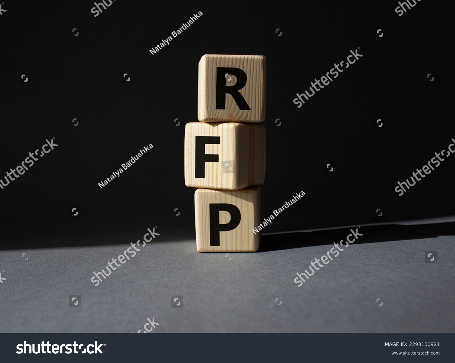 RFP - Request for Proposal. Wooden cubes with word RFP. Beautiful grey background. Business and Request for Proposal concept. Copy space. #2293100921
