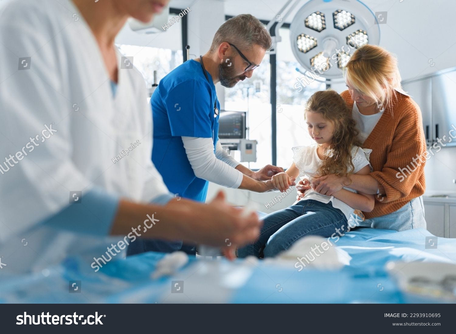 Little girl with her mother in surgery examination. #2293910695