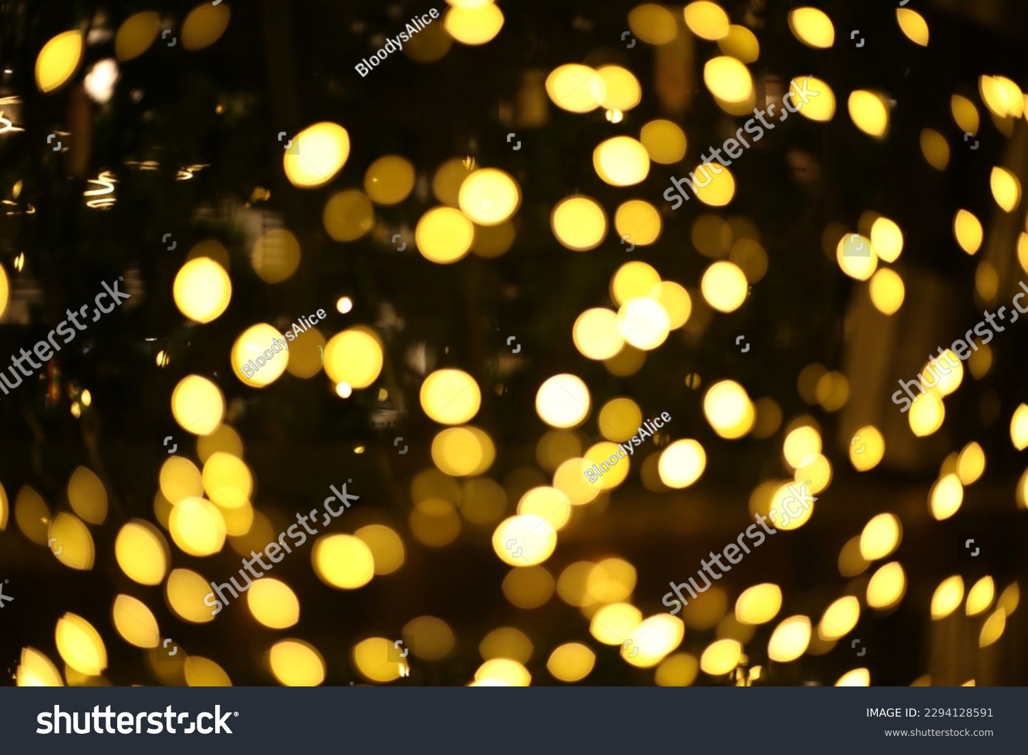 blur bokeh circus tube lamp hang from ceiling in dark room like firefly #2294128591