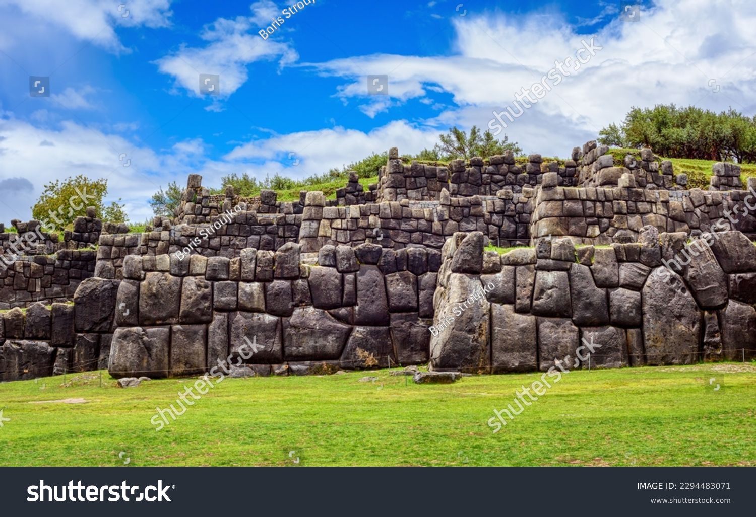 The historic stone walls of the Inca Sacsayhuaman citadel in Cusco town, Peru, a famous UNESCO World Culture Heritage site and a popular travel destination in Peru #2294483071