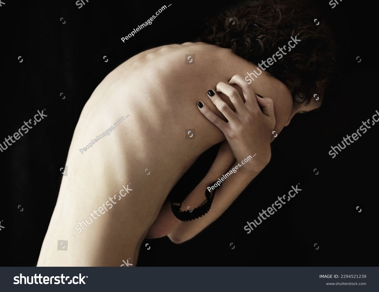 Anorexia, bulimia and back of woman in studio for weight, obsession and ashamed on black background. Eating disorder, mental illness and spine of girl suffering phobia, body dysmorphia or disgust #2294521239