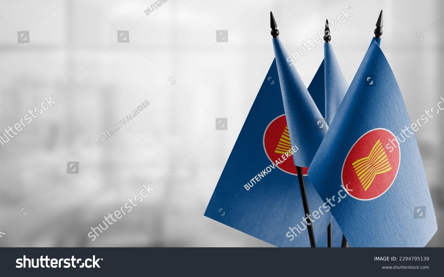 Small flags of the ASEAN on an abstract blurry background. #2294795139