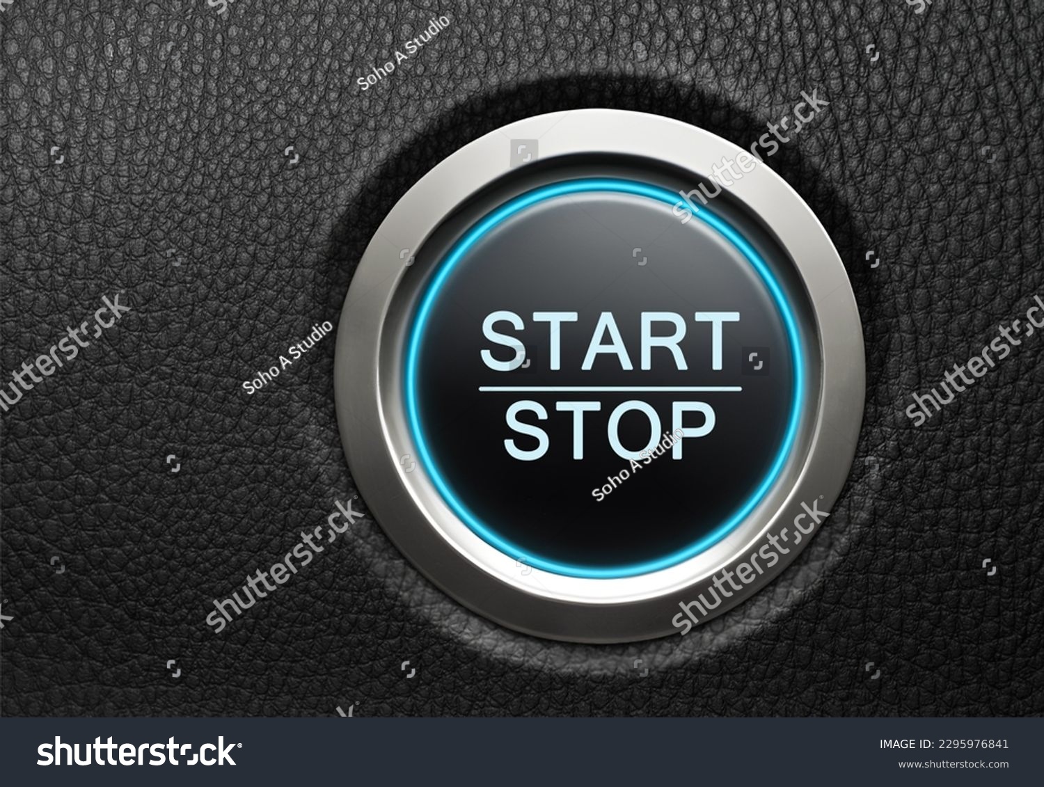 Engine Start Stop button on modern car. Black leather dashboard copy space #2295976841