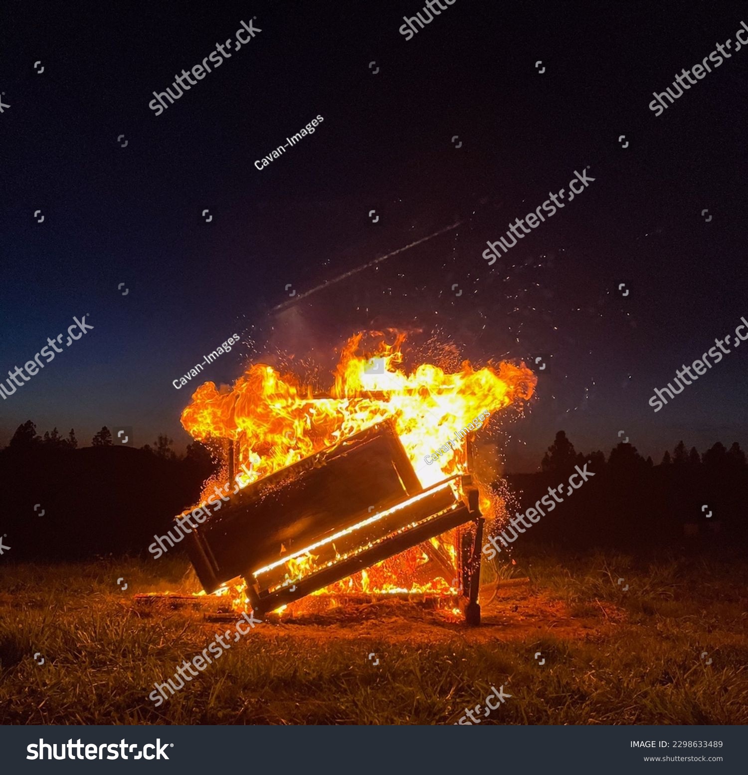 Piano burning in a field in Northern California #2298633489