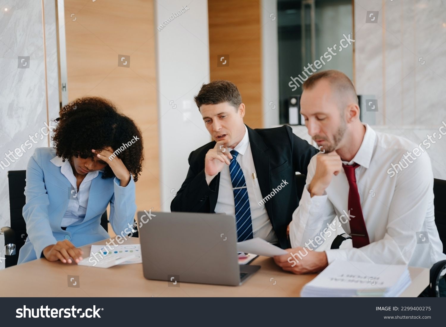 Team thinking of problem solution at modern office meeting, sad diverse business people group shocked by bad news, upset colleagues in panic after company bankruptcy concept #2299400275