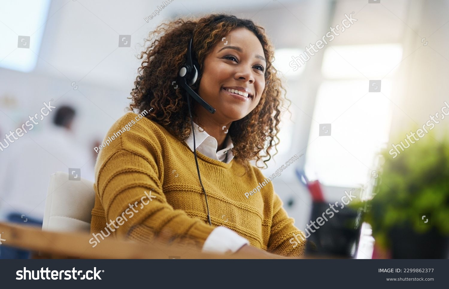 Happy african woman, call center agent or listen on voip headset for consulting, communication or contact. Girl, customer service or tech support crm with smile, headphones or microphone at help desk #2299862377