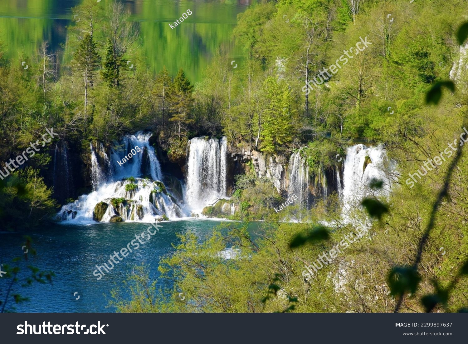 Waterfalls flowing from Kozjak to Malinovac lakes at Plitivice lakes in Lika-Senj county, Croatia in summer  #2299897637
