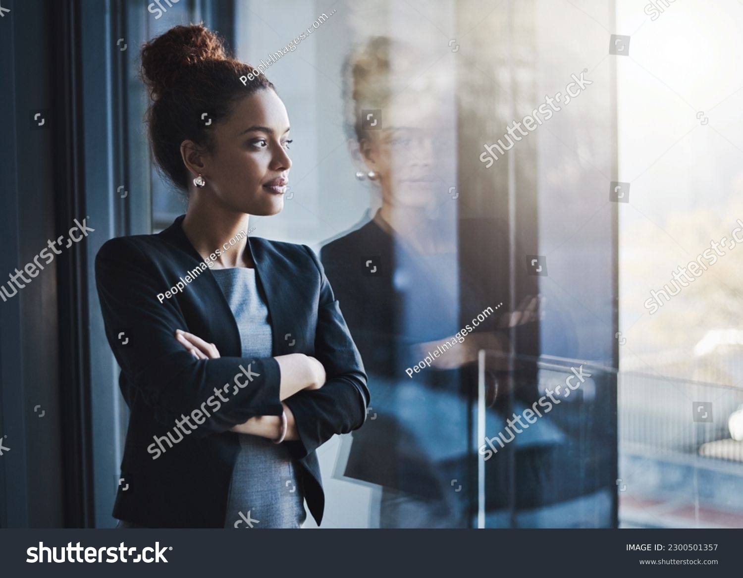 Business woman, window and thinking for vision, goals and future of career with ideas, mission and mindset. Young businesswoman, focus and ambition in workplace with memory, reflection and dream #2300501357