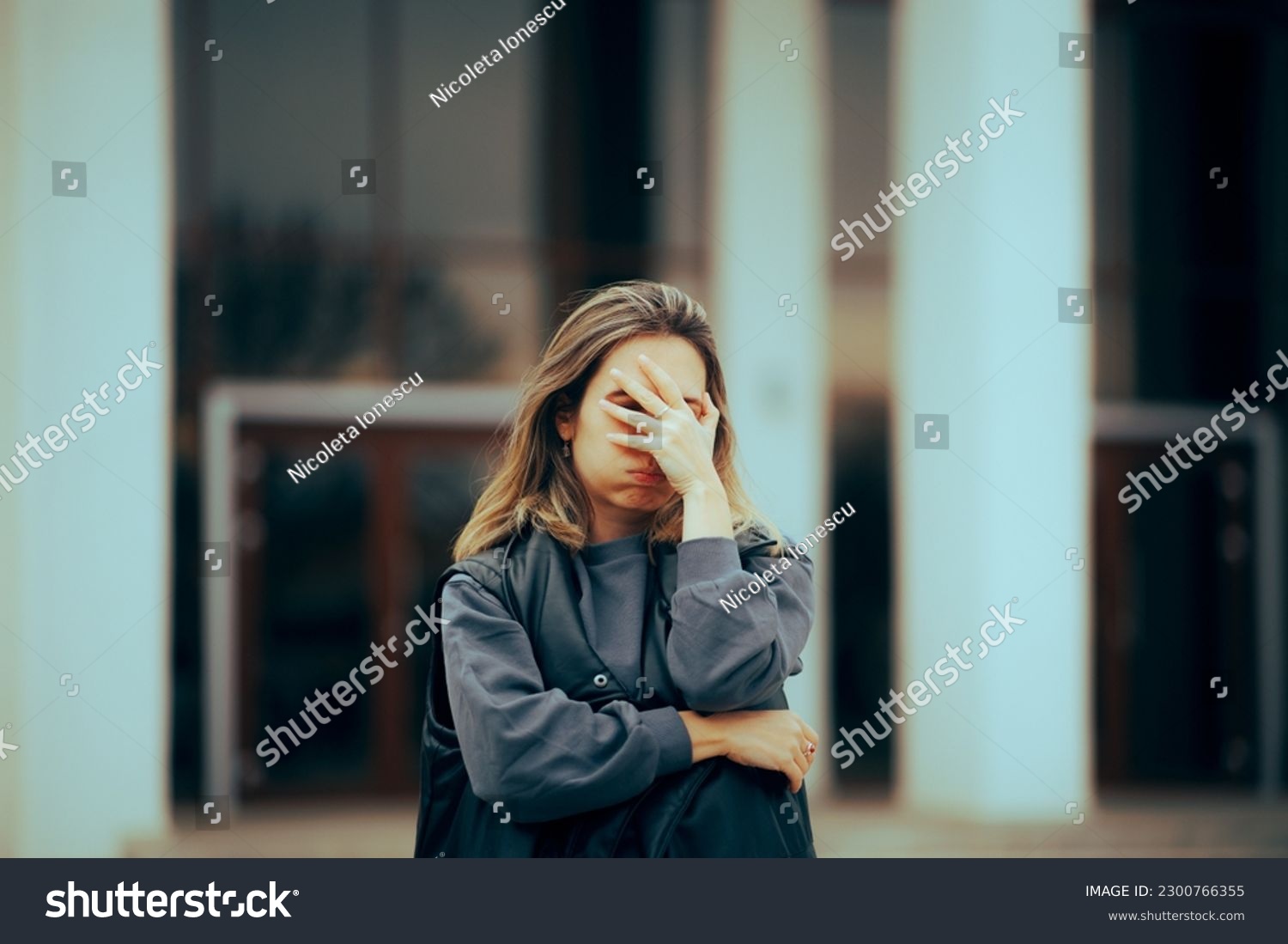 
Unhappy Woman Making Facepalm Gesture Waiting Outside. Stressed person having a breakdown regret crisis
 #2300766355