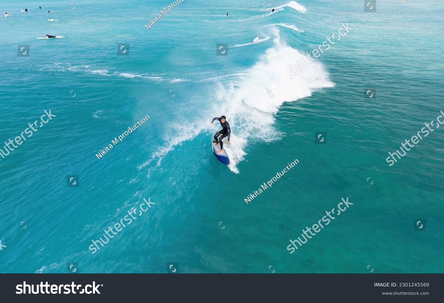 Surfer riding a wave in Hawaii #2301245569