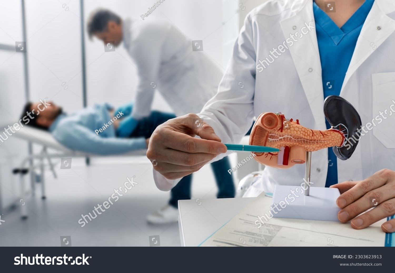Doctor palpates man patient abdomen and examines belly in medical clinic to analyze condition of pancreas. Treatment of pancreatic diseases, acute and chronic pancreatitis #2303623913