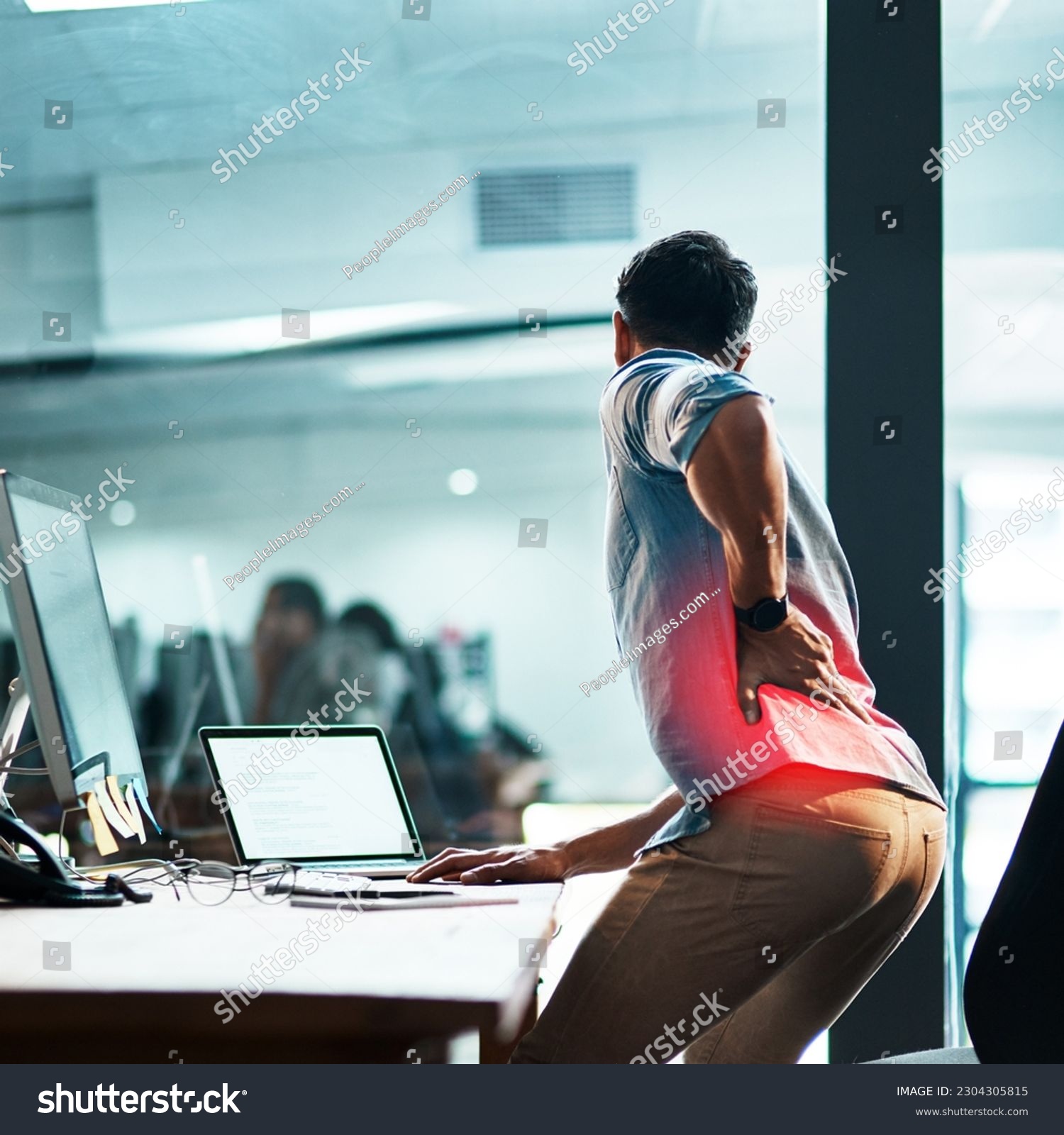 Back pain, injury and business man at desk with red muscle, health risk and fatigue in office. Uncomfortable employee with spine problem, bad posture and injured body with glow of burnout from stress #2304305815