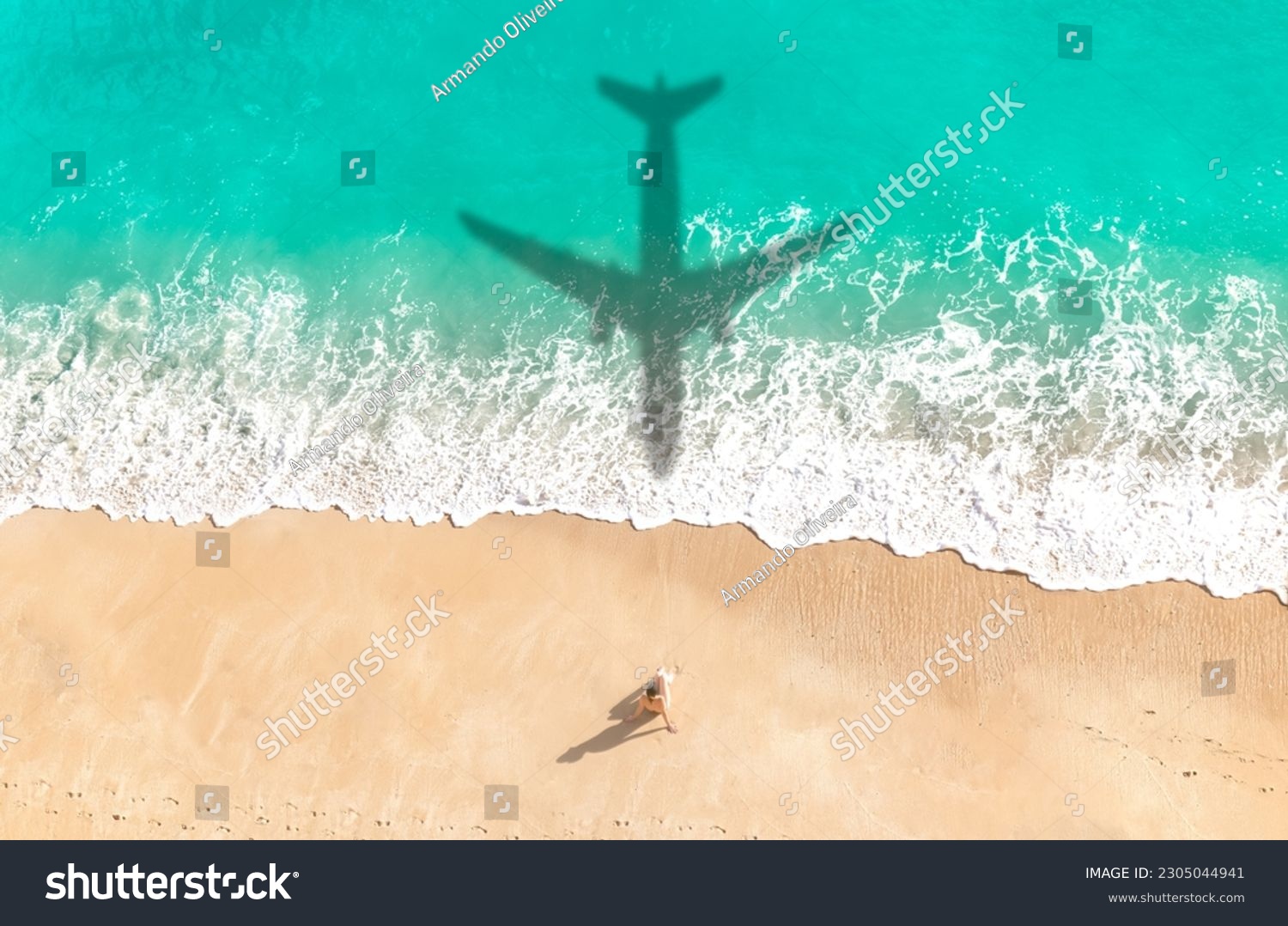 Airplane shadow flying over beautiful exotic tropical beach with woman sunbathing on a sunny cay - Summer vacation travel concept #2305044941