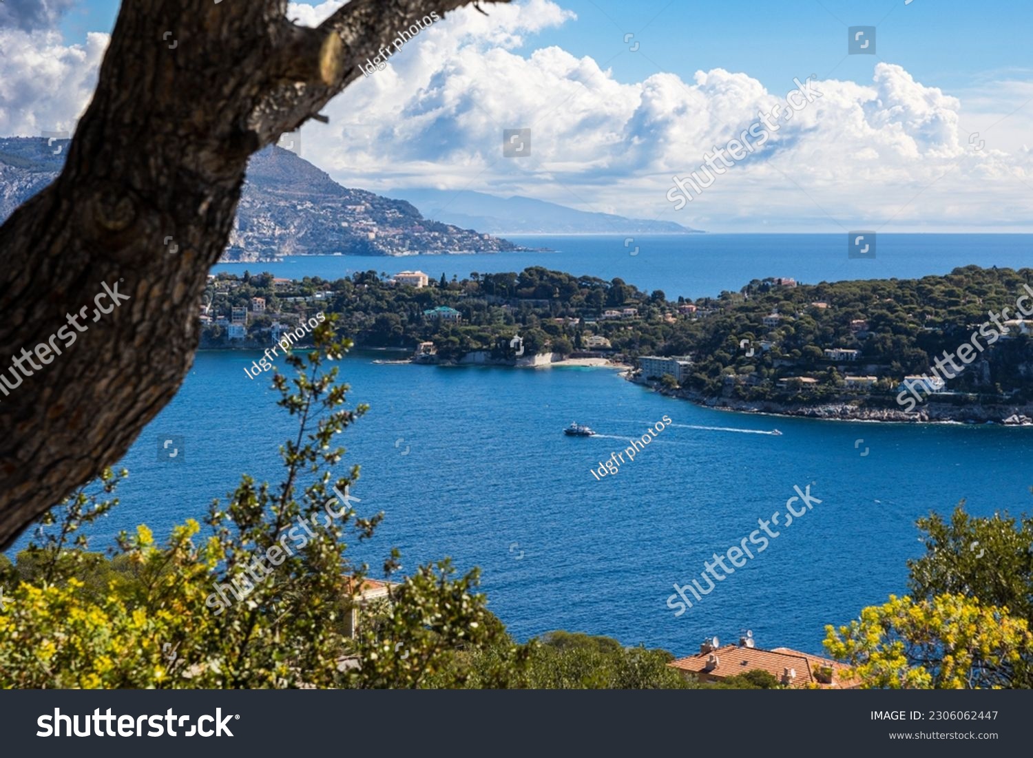 Small boat sailing in the Villefranche-sur-Mer Roadstead from Mont Alban in Nice #2306062447