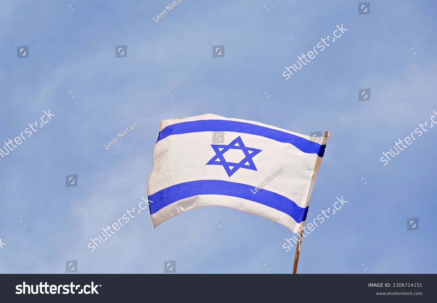 75 years since the founding of the State of Israel.
Flag of Israel. State symbol.
Flag of Israel on the background of the Wailing Wall. #2306714151