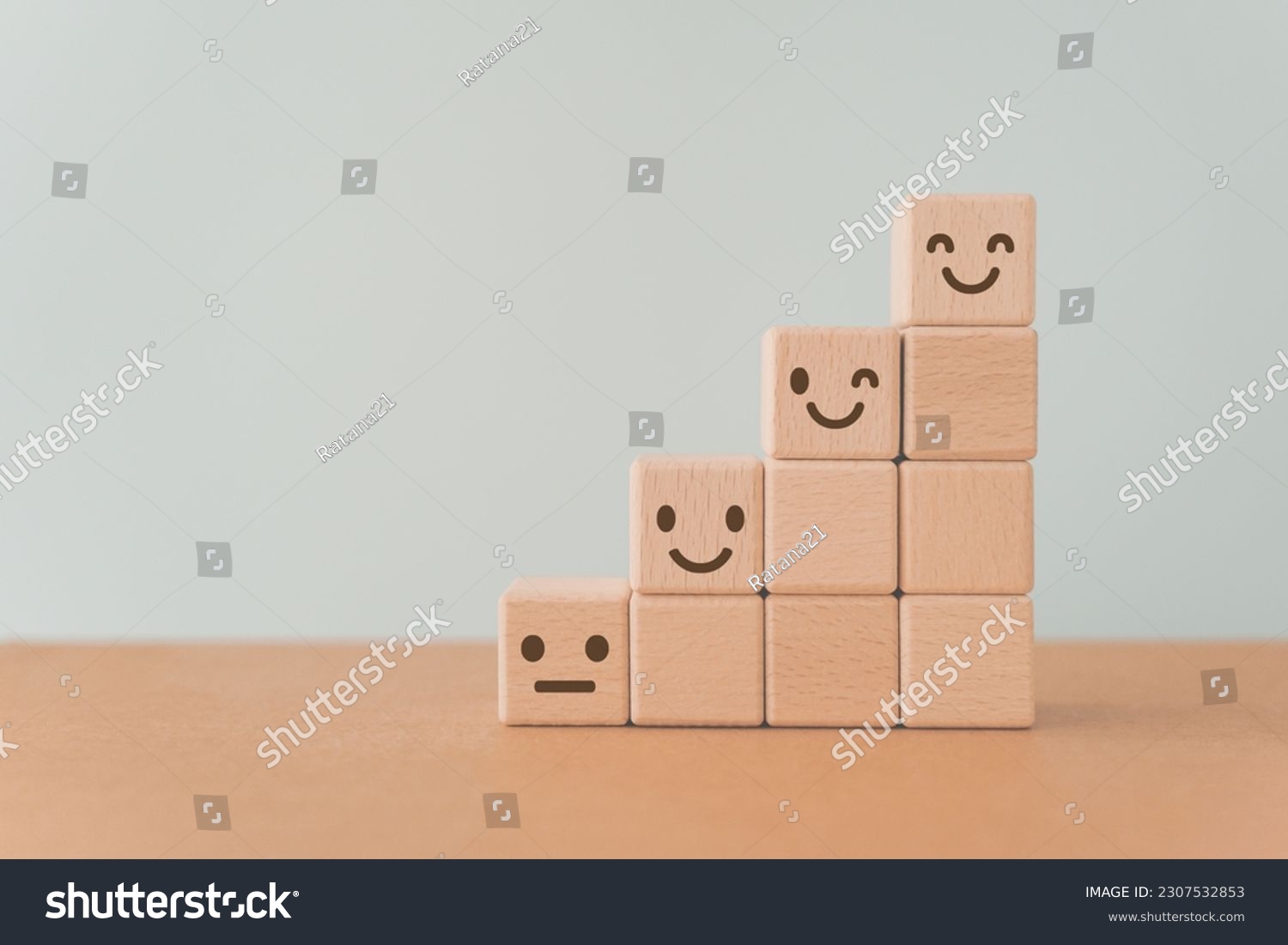 For positive thinking, added value, benefits, additional, personal development, growth mindset, positive thinking, opportunities,  mental heath concept. emoticon face on stack of wooden cube blocks #2307532853