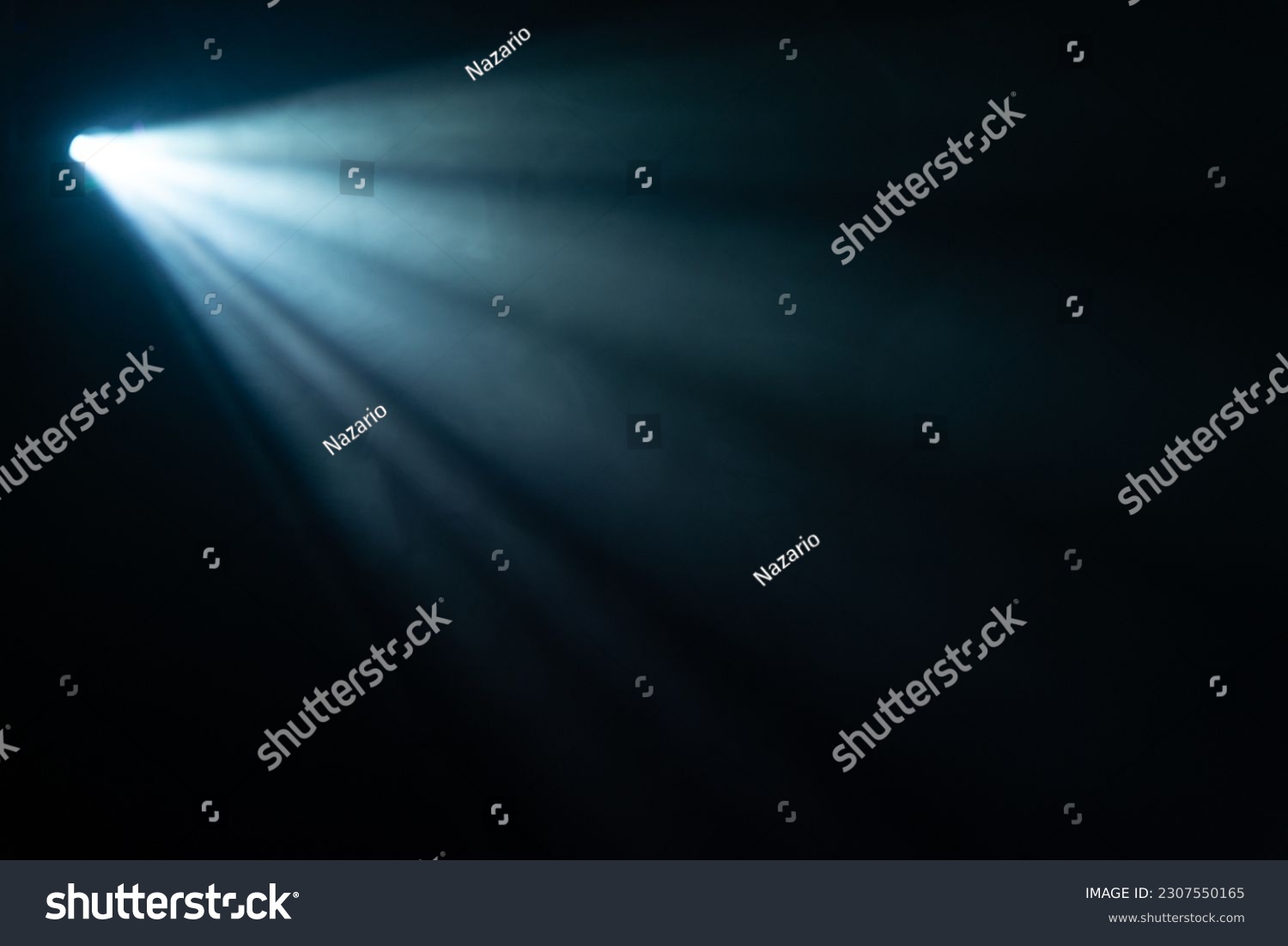 blue spotlight light beam on black background #2307550165