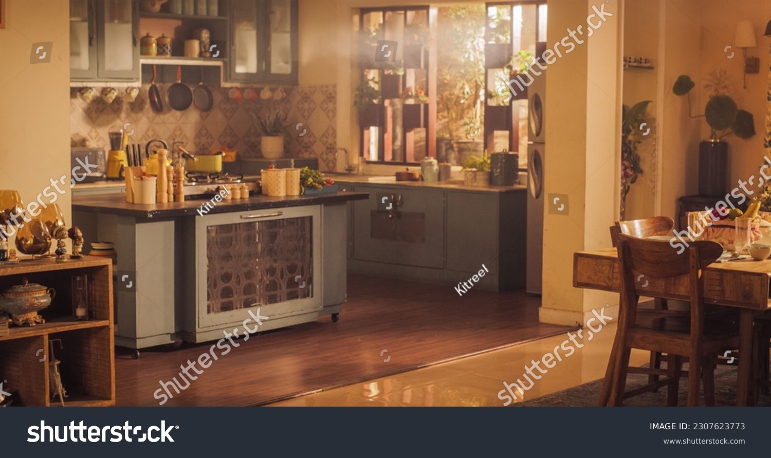 Wide Shot of an Empty Cosy Kitchen Decorated with Indian Style. Stylish Traditional South Asian Home with Utensils and Wide Window Letting the Spring Warmth and Light in. Vintage Warm Aesthetic #2307623773