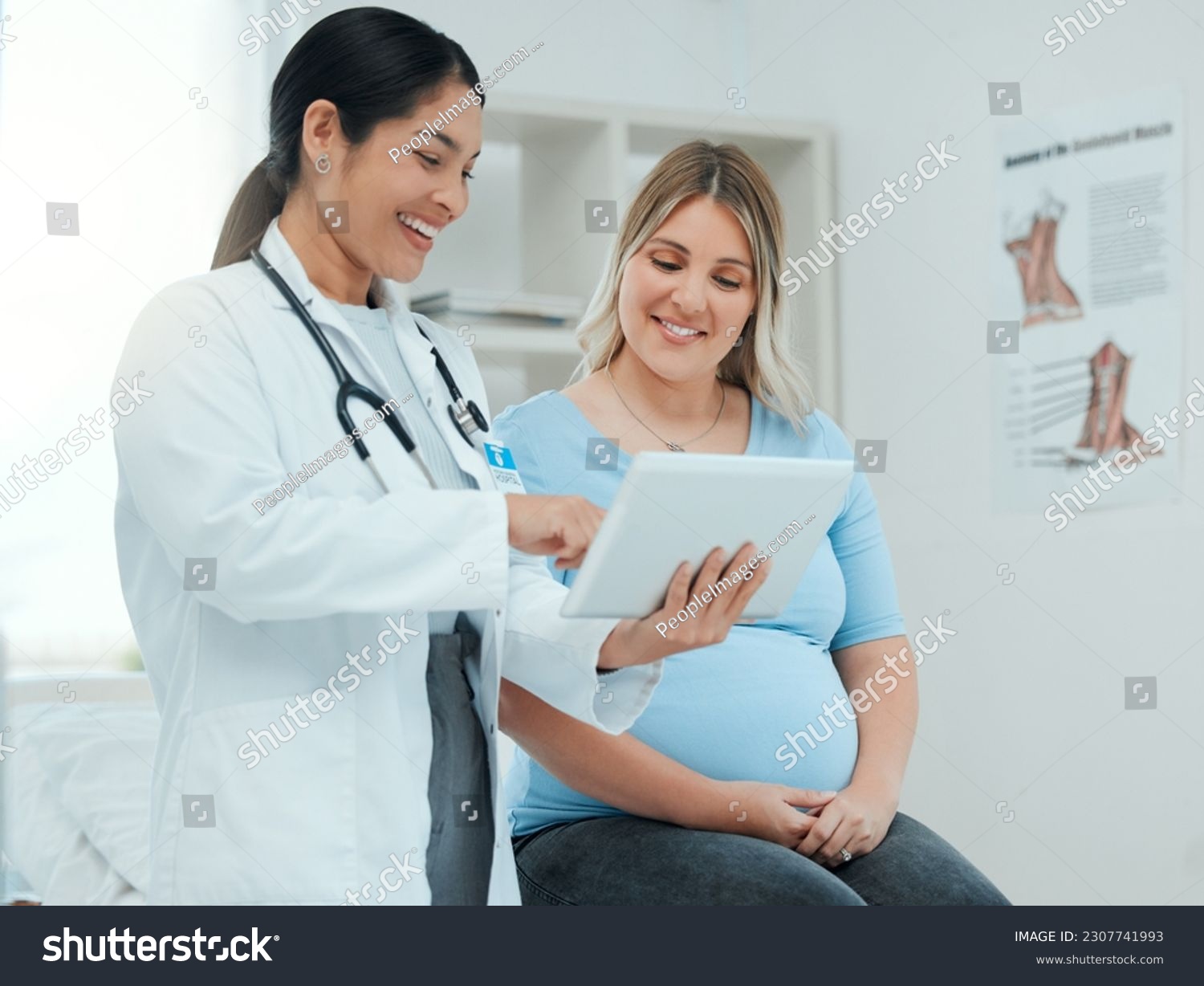 Healthcare, tablet and pregnant woman at a prenatal consultation for health in a medical clinic. Wellness, maternity and female pregnancy doctor speaking to a mother with a digital mobile in hospital #2307741993