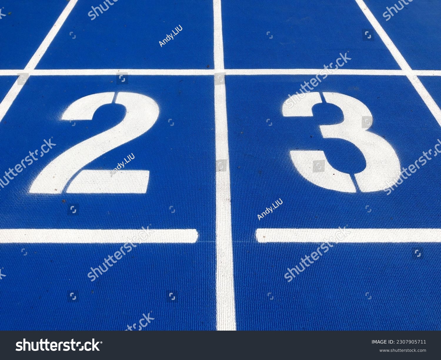 Stadium runway or athlete's track start number (2) (3). Tracks are rubber man-made tracks used in athletics. #2307905711