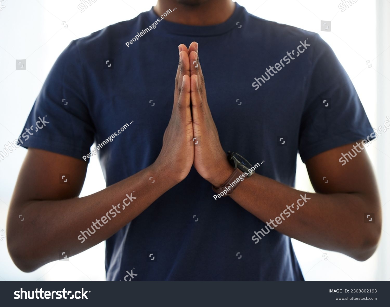 Hands, worship and man praying in studio in hope of help, guidance and gratitude in white background. Hand, pray and male person in prayer to Jesus Christ, humble and spiritual, holy and Christianity #2308802193