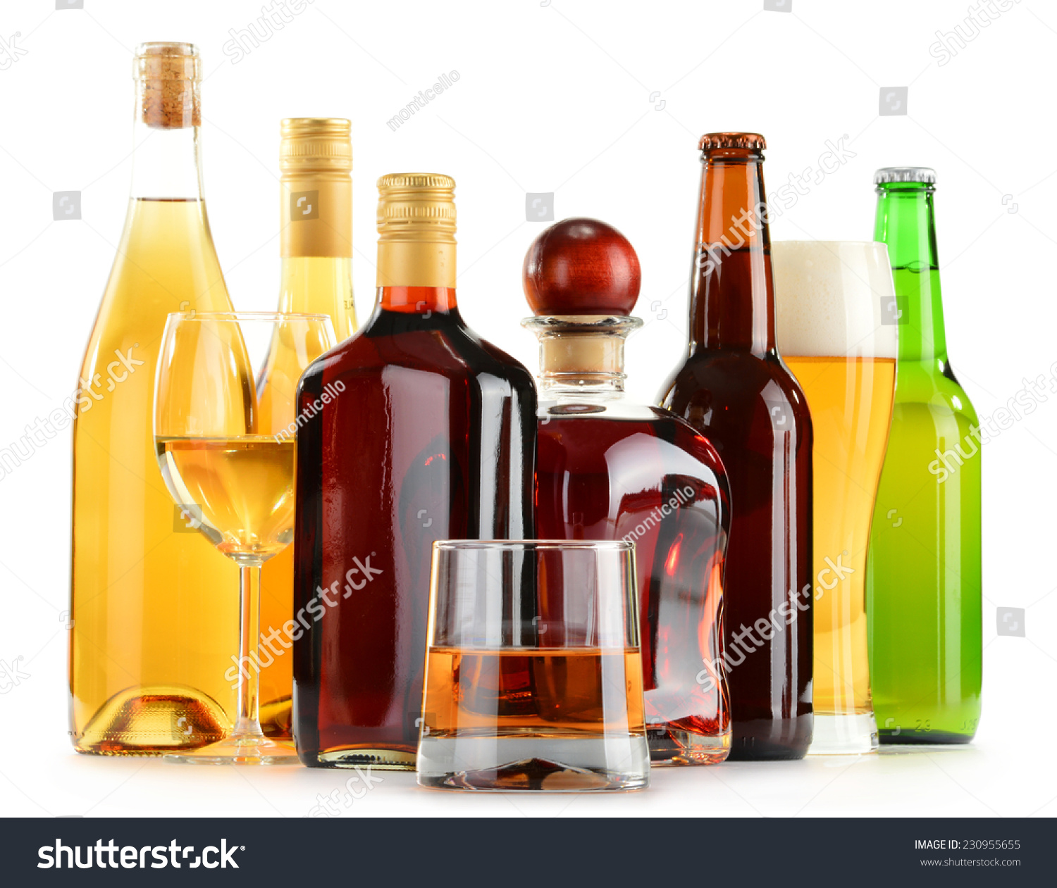 Bottles and glasses of assorted alcoholic beverages isolated on white background #230955655