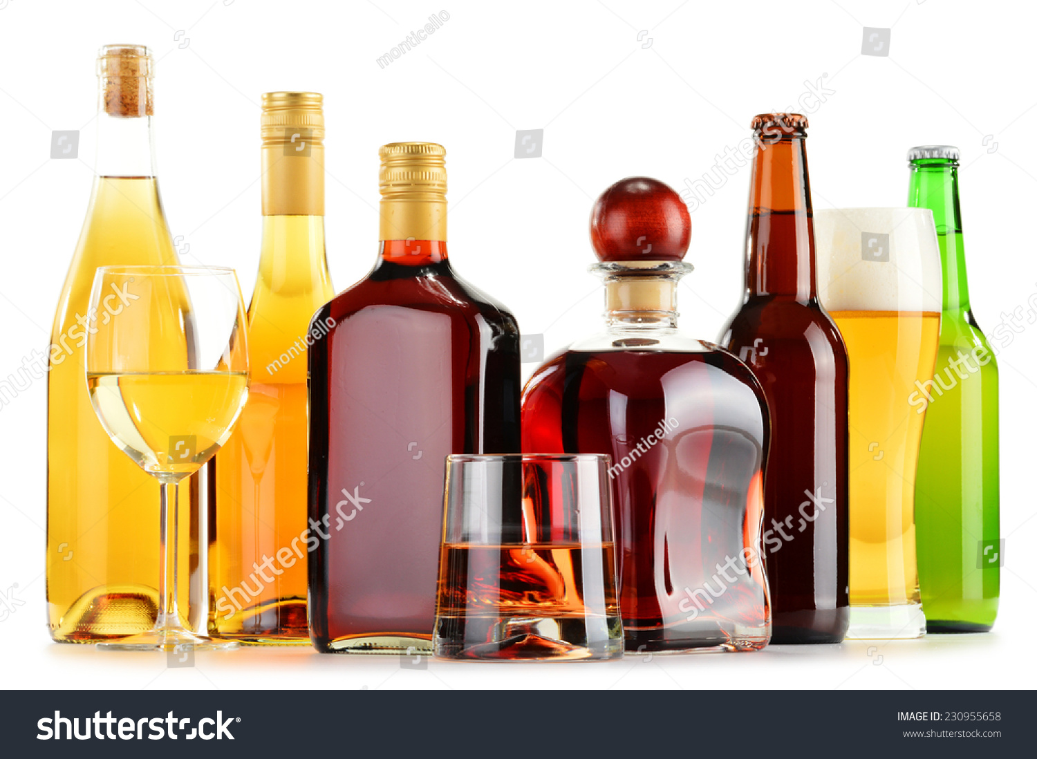 Bottles and glasses of assorted alcoholic beverages isolated on white background #230955658