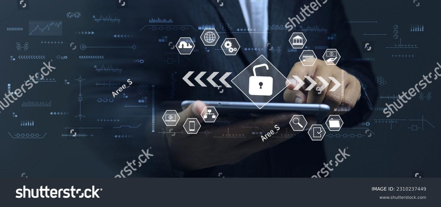 Businessman unlocks smartphone to access financial applications find market information or transfer money for trading Cyber security and ISO 27001 information technology concept. #2310237449