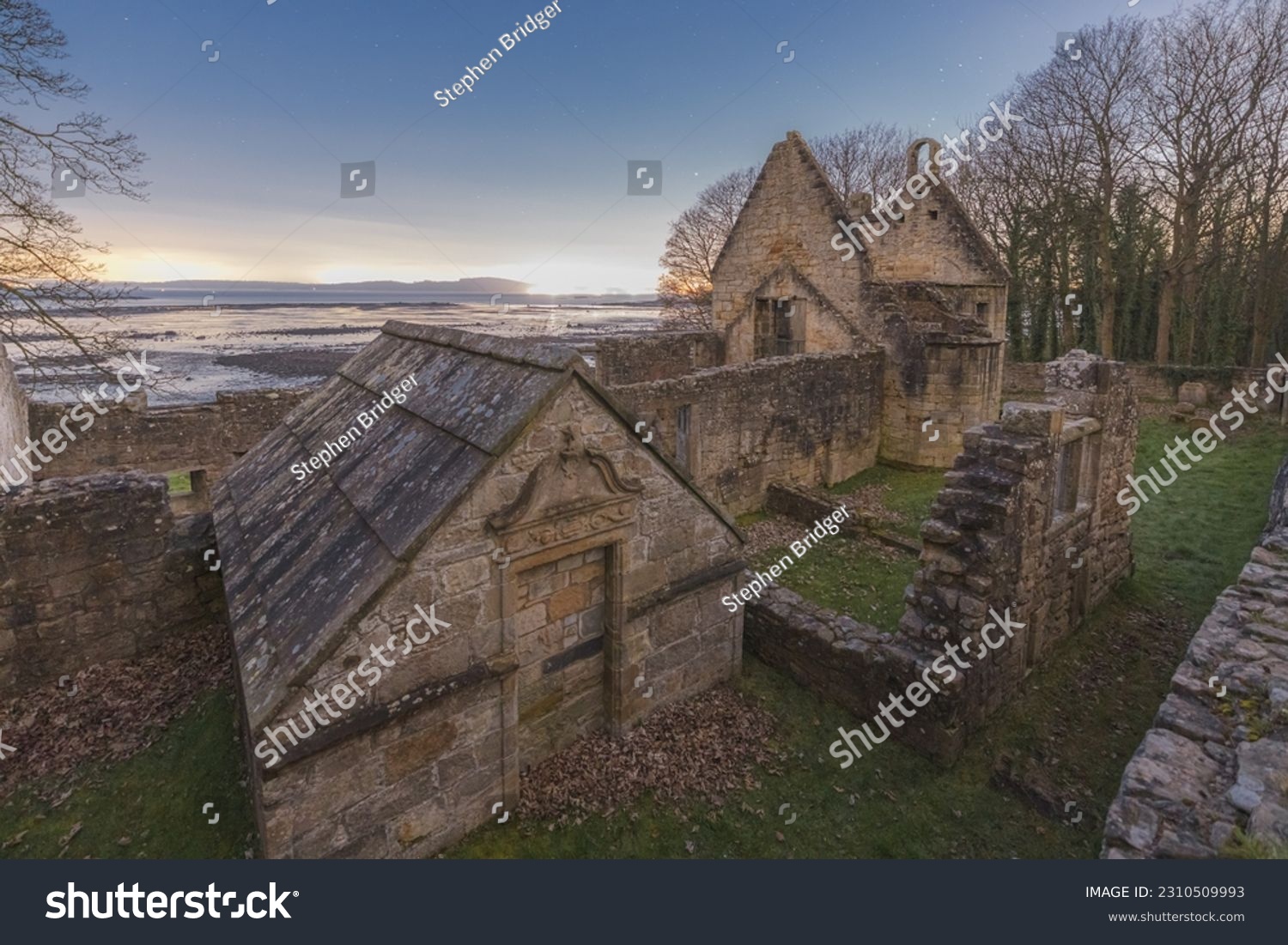Ancient medieval stone ruins of historic 12th century church St. Bridget's at night along the seaside Fife Coastal Path in Dalgety Bay, Scotland, UK. #2310509993