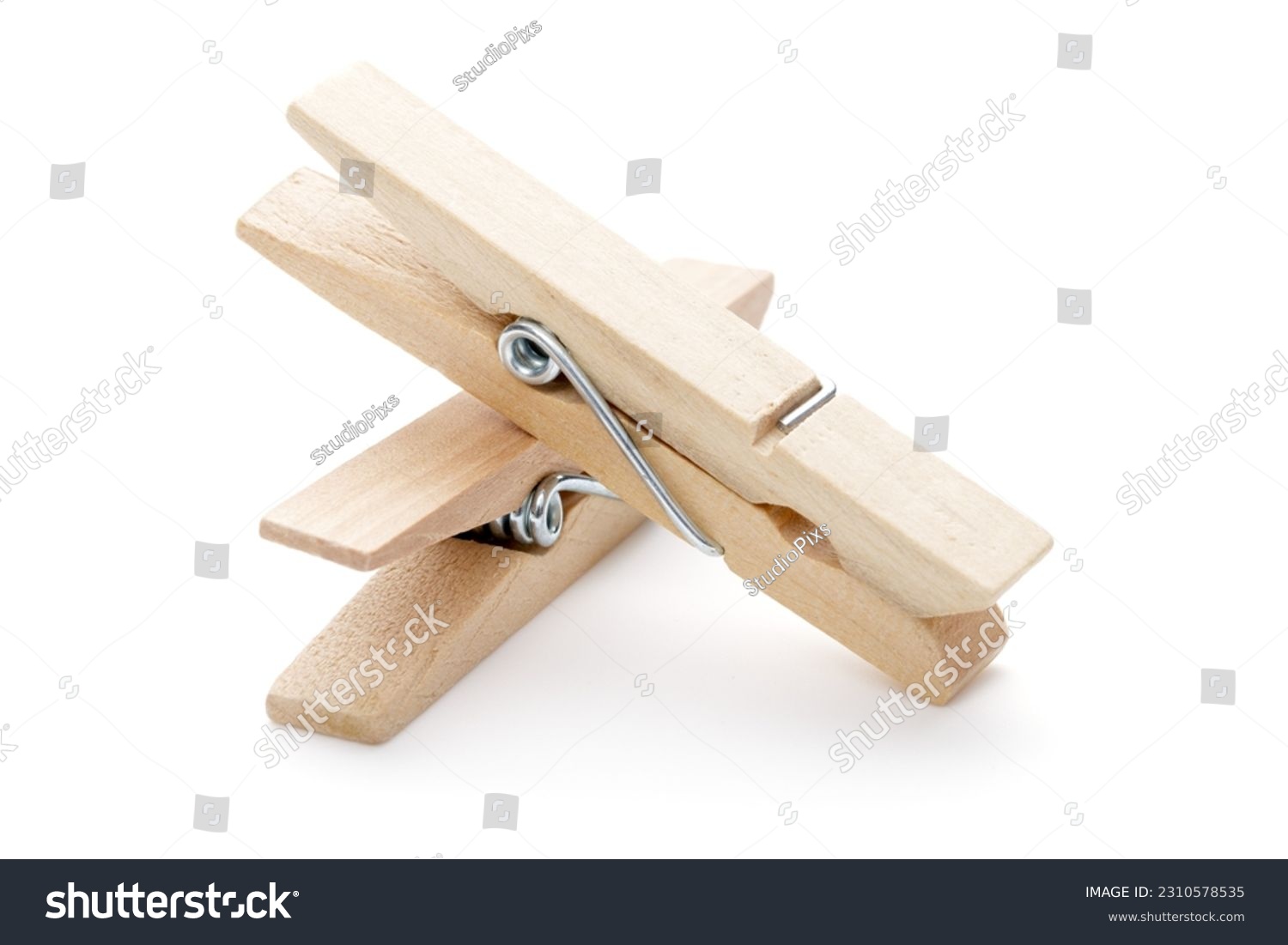 Wooden clothes pegs isolated on white background. Cutout. Clothespin.  #2310578535