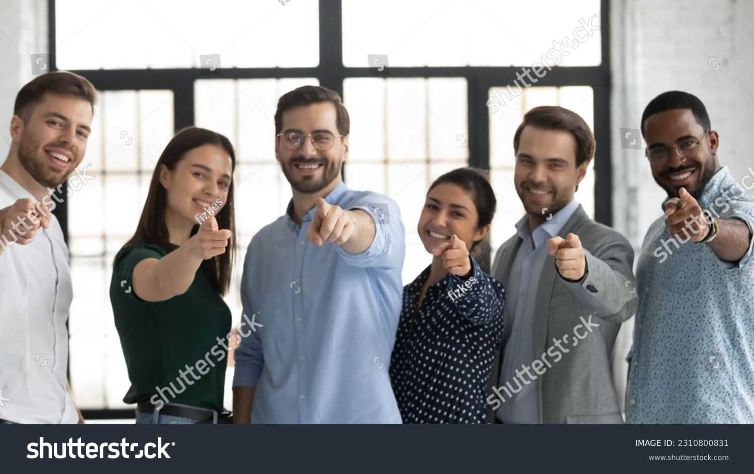 We need you. Happy confident professional group pointing finger at camera. Diverse millennial team of employees making choice, offering job, searching candidates for hiring. Head shot photo portrait #2310800831
