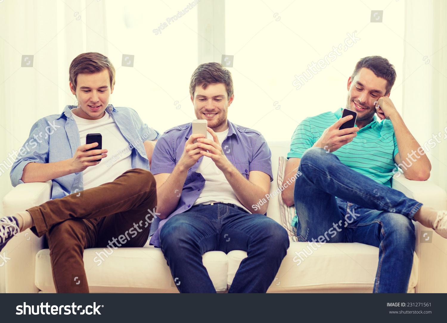 friendship, technology and home concept - smiling male friends with smartphones at home #231271561