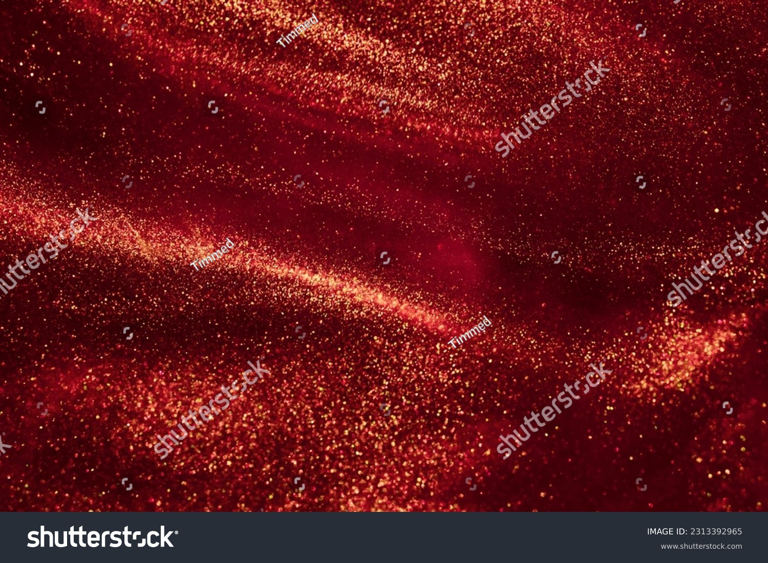 Magic Galaxy of golden dust particles in red fluid. Various stains and overflows of gold particles with burgundy tints. Fantastically beautiful abstract background. #2313392965