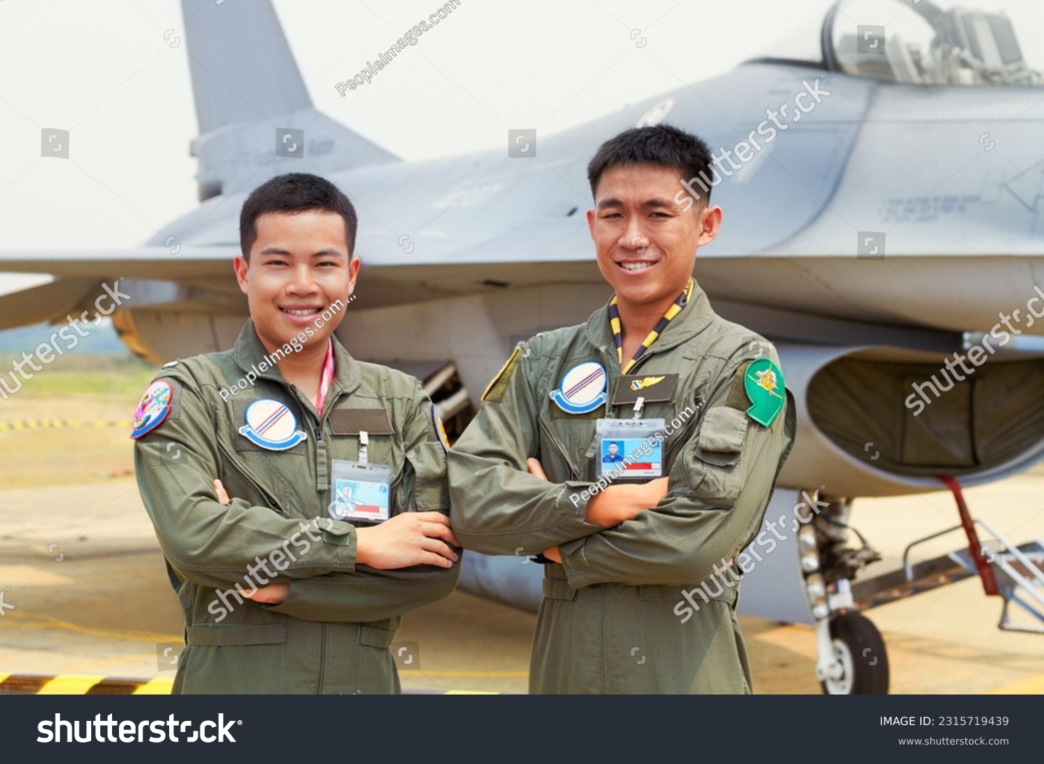 Portrait of men, fighter pilot team in military with jet and smile at airforce base with arms crossed in Korea. Freedom, transport and proud Asian soldier with airplane, confident and service in army #2315719439