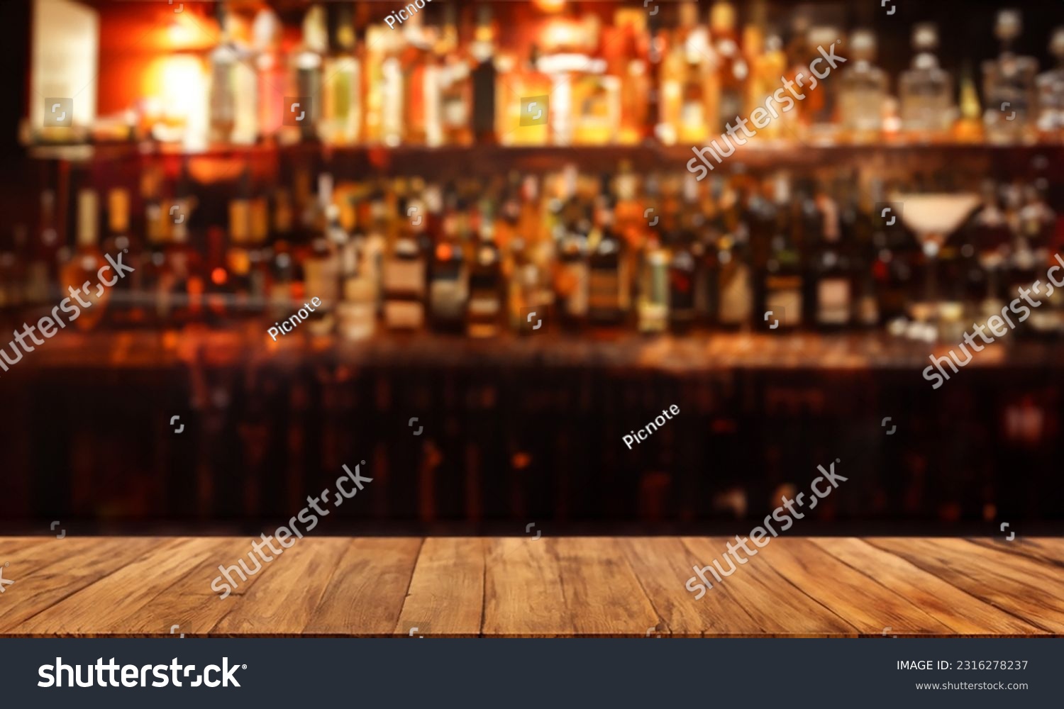 Liquor bar background in softfocus with woonden table #2316278237