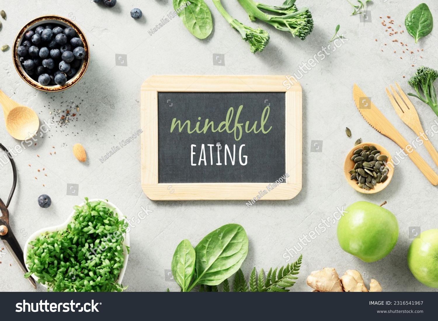 Vegetarian vegan healthy ingredients and mindful eating chalk board on grey stone background. Healthy eating, eco friendly, zero waste concept #2316541967