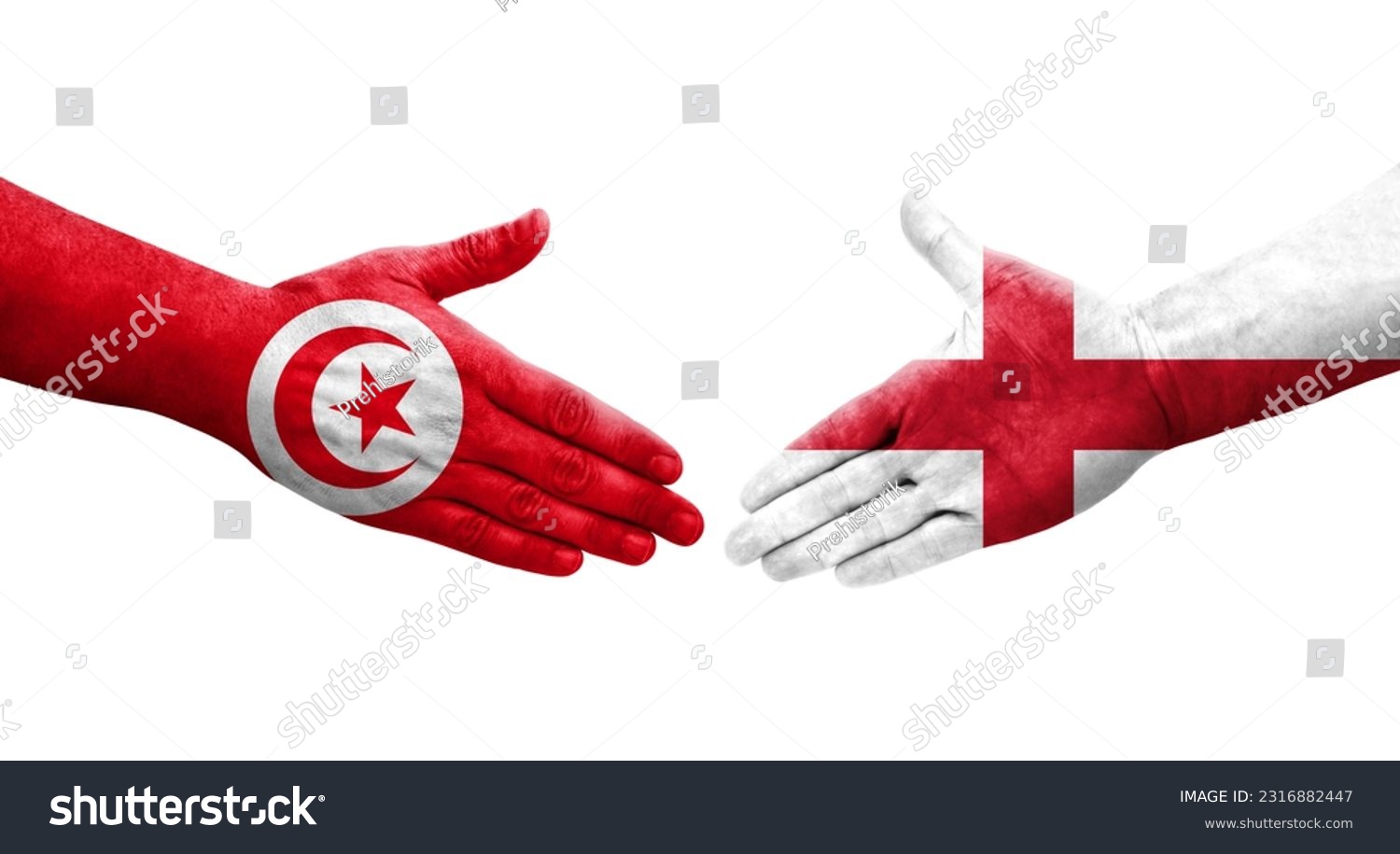 Handshake between England and Tunisia flags painted on hands, isolated transparent image. #2316882447