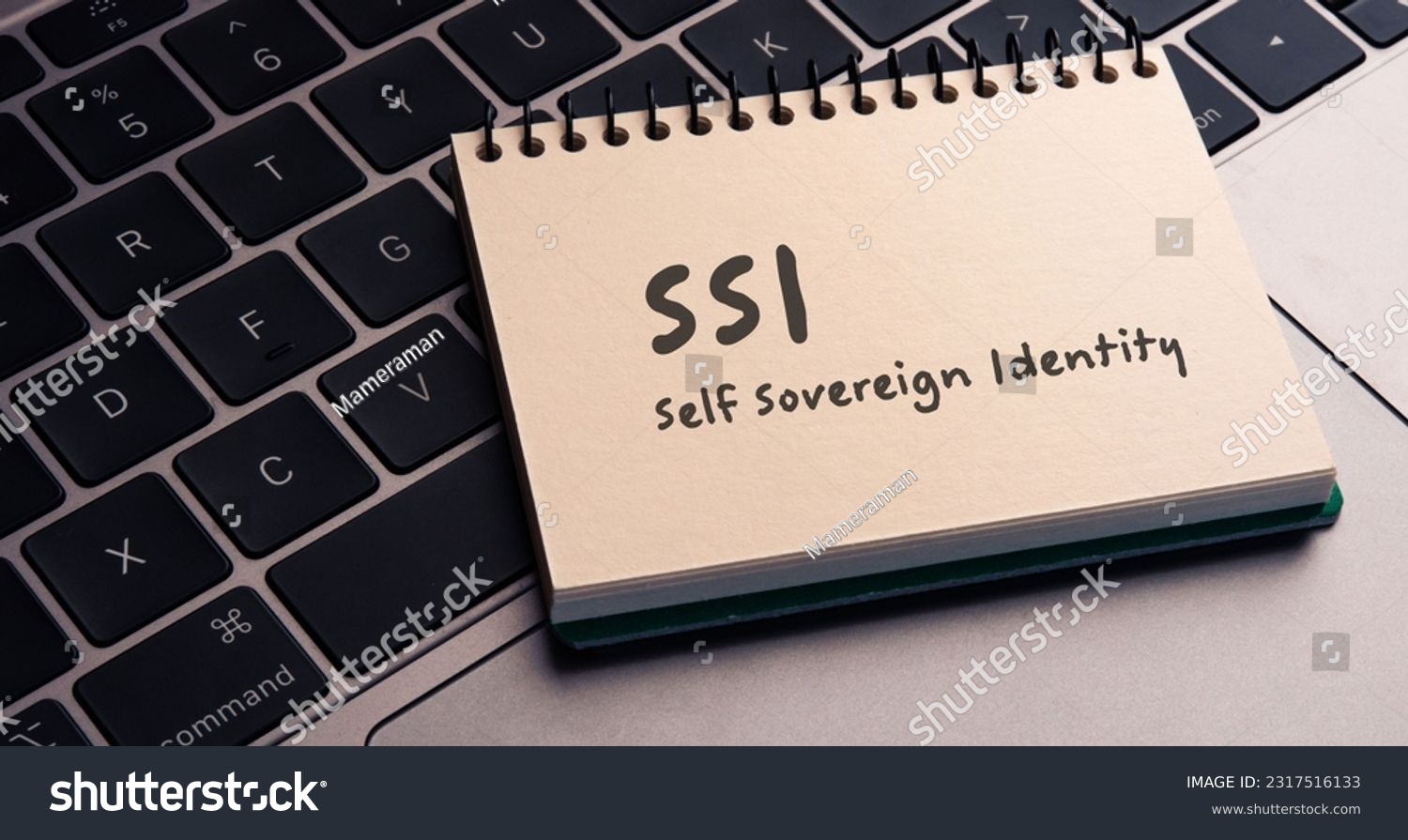There is notebook with the word SSI Self Sovereign Identity. It is as an eye-catching image. #2317516133