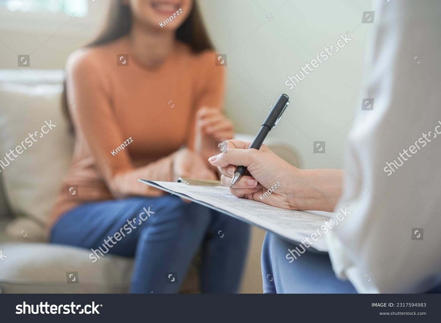 Psychology, depression. smile asian young woman, female patient mental explained symptom with psychologist, psychiatrist while doctor woman taking notes at clinic. Encouraging, therapy. #2317594983